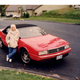 My mom next to the Cadillac Allanté